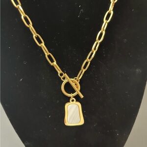 Beautiful White Jade Pendant on a 16 inch 18k gold plated chain